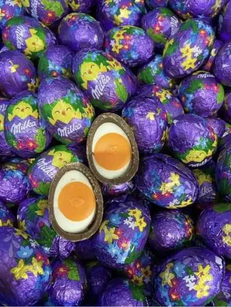 Шоколадне яйце Milka з жовтком в фользі 31г - 1