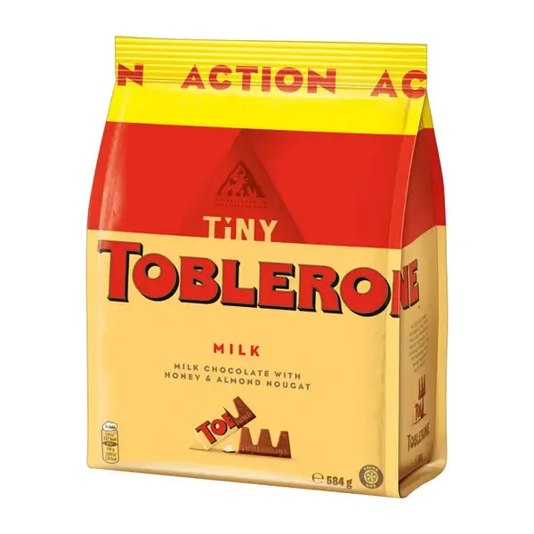 Шоколад молочний трикутний Toblerone Tiny Milk&Honey Chocolate with Almond nougat з медом та мигдальною нугою 73шт 584г - 1