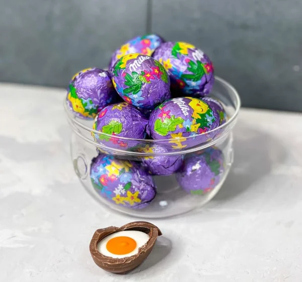 Шоколадне яйце Milka з жовтком в фользі 31г - 2