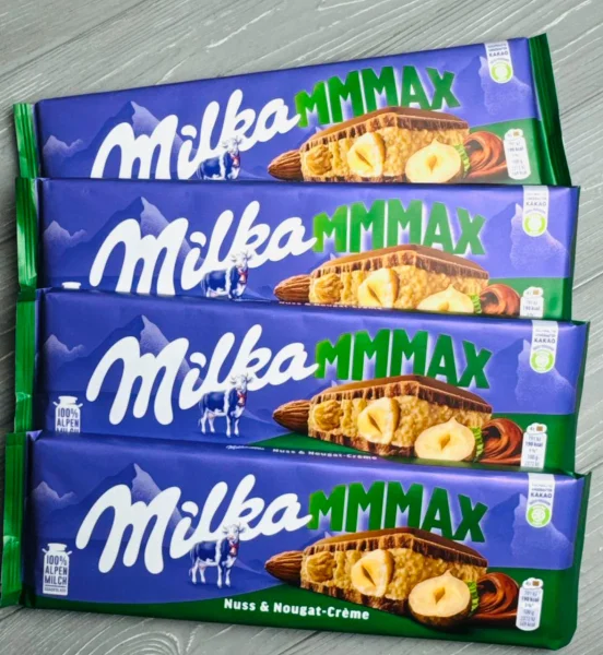 Шоколад молочний плитка Milka MMMAX Nuss&Nougat Creme Hazelnuts Мілка з цільними Лісовими горіхами та нугою 280г - 2