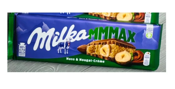 Шоколад молочний плитка Milka MMMAX Nuss&Nougat Creme Hazelnuts Мілка з цільними Лісовими горіхами та нугою 280г - 1