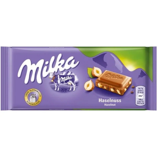 Шоколад молочний плитка Milka Haselnuss з лісовими горіхами 100г - 1