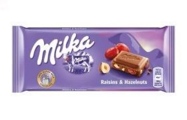 Молочний шоколад Milka мілка з родзинками та фундуком/milka raisin hazelnut 100 г. - 1